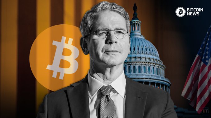 A man in a suit and glasses stands in front of a backdrop featuring a Bitcoin logo, the U.S. Capitol building, and an American flag, with a "BITCOIN NEWS" logo in the top right corner, visually representing the U.S. government's crackdown on Iran's use of cryptocurrency, as evidenced by the Treasury's recent sanctions on BitBank for processing Bitcoin payments tied to the IRGC.