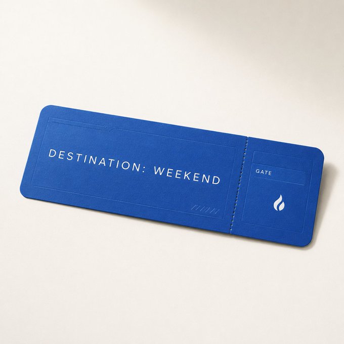 A blue boarding pass-style card rests on a cream surface, displaying the text "DESTINATION: WEEKEND" and "GATE" with a small flame icon. The clever design mimics a flight ticket to "the weekend," matching the playful message about boarding successfully toward a happy weekend, with the flame symbol serving as a nod to the sender's "fire pal" sign-off.