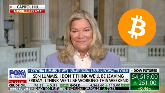 Senator Cynthia Lummis (R-WY), Chair of the Senate Digital Assets Subcommittee, appears on Fox Business from Capitol Hill, advocating for passing the Clarity Act to establish a regulatory framework for digital assets like Bitcoin in the United States, while market indicators show Dow Futures at 54,519.00 (+0.46%) and Crude Oil at 76.28.