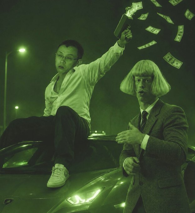 A stylized green-tinted photo featuring a man with a gun sitting on a car and another man in a suit and blonde wig standing beside him, with money flying through the air.