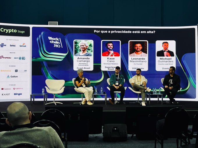 A panel discussion on the 'Crypto Stage' features four speakers including Amanda Carmago (Zcash Brasil), Kaue Cano (Superteia Brasil), Leonardo Maximiliano, and Michael Guimarães (Country Lead Brazil, Zcash).
