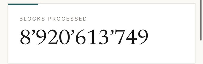A graphic displays "BLOCKS PROCESSED" above the number 8'920'613'749, showing the Internet Computer's progress while nearing the 9 billion block milestone mentioned in the accompanying text.