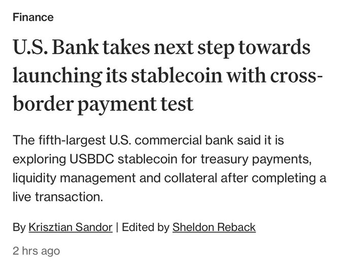 A news headline announces "U.S. Bank takes next step towards launching its stablecoin with cross-border payment test," detailing that the fifth-largest U.S. commercial bank is exploring USBDC stablecoin for treasury payments, liquidity management, and collateral following a live transaction. The image supports the accompanying post's claim of US Bank completing its first cross-border payment using the USBDC stablecoin on the Stellar platform.