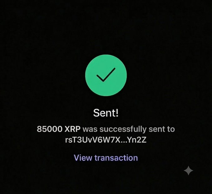 The image features a post that congratulates someone for successfully sending money using cryptocurrency. The caption of this message says, "I wanna send $85,000 to another follower who has never won Just say '$XRP'".