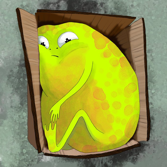 An illustrated yellow-green blob creature with sad eyes sits curled up inside an open cardboard box against a textured gray background.