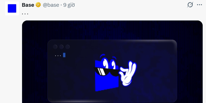 The image features a blue square with a cartoon character, possibly a person or an animal, wearing sunglasses and holding up their hand as if waving at someone. The background of the image is dark blue, which contrasts with the bright blue square and adds depth to the scene. The caption below the image reads "Mình nghĩ Base sắp ra token Đợt Arbitrum cũng làm video hint như thế này." This phrase is likely a reference to the post or message that includes the cartoon character and the dark blue background.