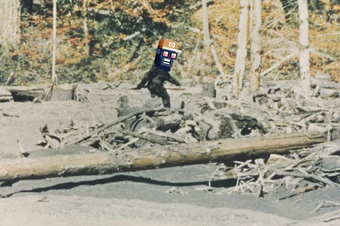 A legendary Bigfoot is humorously depicted with a Doctor Who TARDIS head (labeled "100") wandering through a wooded area, playfully referencing the "Bitfoots" ordinal NFT project and its $5 mint price mentioned in the post.