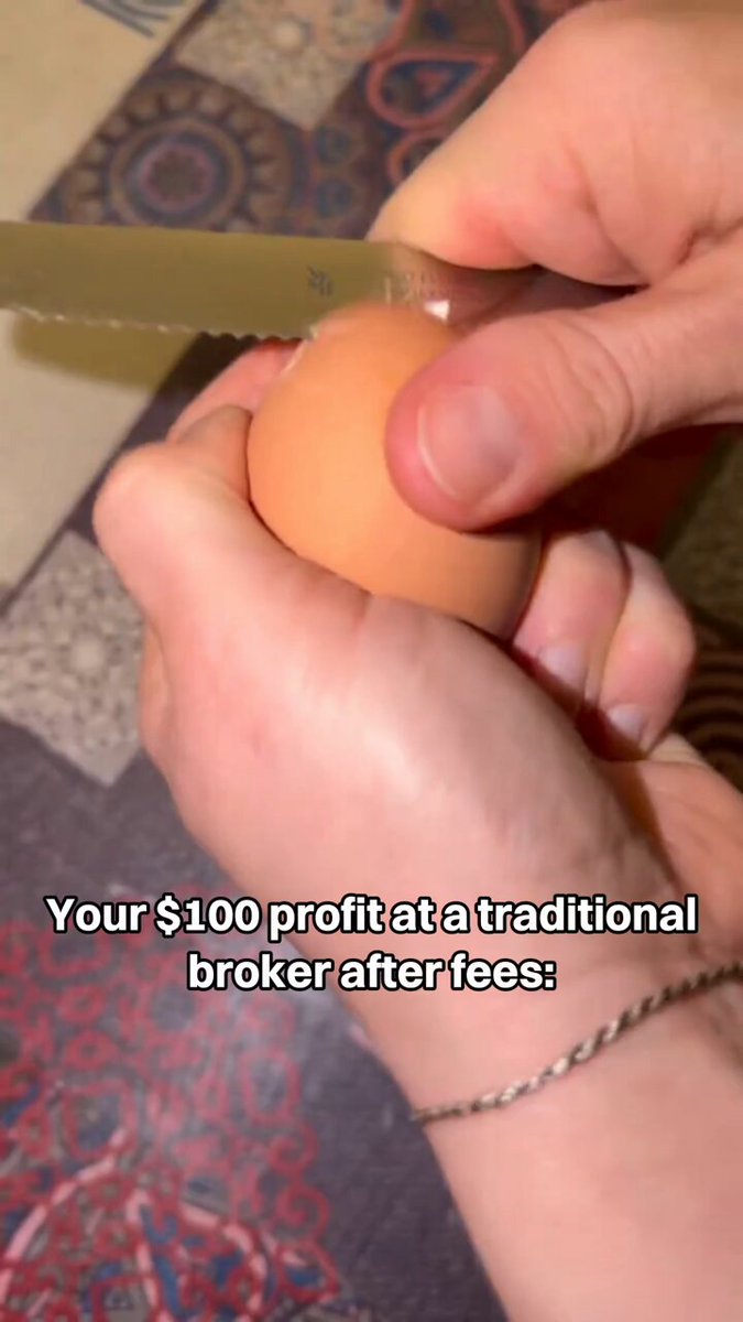 A person cutting an egg into small pieces using a knife, as indicated by the caption "Your $100 profit at a traditional broker after fees!". The image appears to be promoting an alternative way of trading where people can make gains without paying high fees typically associated with traditional stockbrokers or online trading platforms.