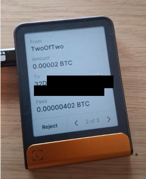 A Ledger hardware wallet displays a Bitcoin transaction of 0.00002 BTC from "TwoOfTwo" to an address on screen 2 of 3, with options to "Reject" the transaction. This image illustrates the advanced multisignature security discussed in the post, showcasing how AnchorWatch uses Ledger devices with miniscript firmware from Wizardsardine to provide 1:1 insured custody solutions.