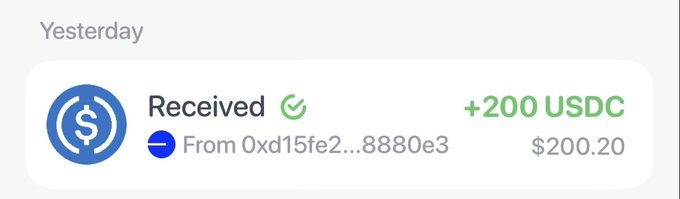 Screenshot of a cryptocurrency transaction notification showing 'Received +200 USDC' ($200.20) from the wallet address 0xd15fe2...8880e3.