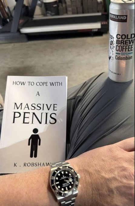 A photo of a person's hand wearing a Rolex watch while holding a book titled 'HOW TO COPE WITH A MASSIVE PENIS' by K. Robshaw, with a Kirkland Cold Brew Coffee can visible in the background.