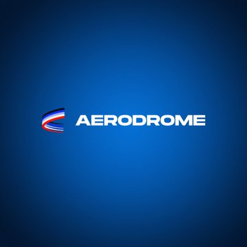 The image features a logo for Aero Dome, which has blue letters that say "AERO" at the top of the image with a line of three colors below it - red (top left), white (middle right), and blue (bottom right). The logo is placed against a dark blue background. Below this logo, there's text in white that reads "BREAKING: $AERO market cap just reclaimed $500M+ up nearly 50% in 2 weeks."