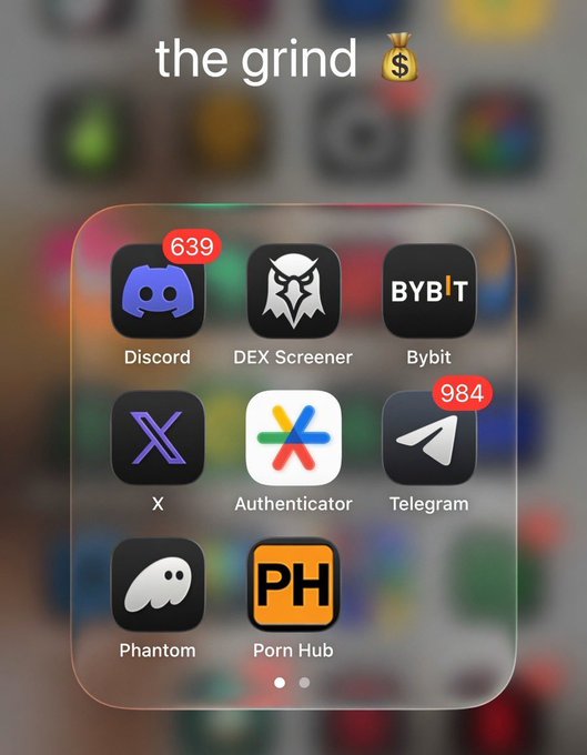 The image displays various app icons, including Discord with 639 notifications, DEX Screener, Bybit, X, Authenticator, Telegram with 984 notifications, Phantom, and Porn Hub, all suggestive of an intense "grind" for crypto riches. This collection of apps, from trading platforms to communication channels, visually represents the user's dedication to making money in the crypto world by 2026.