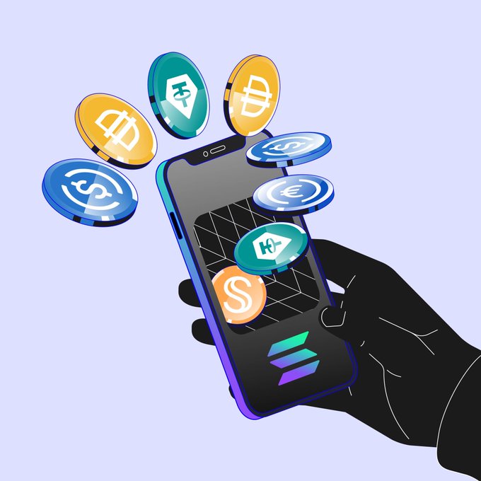 A hand holds a smartphone displaying the Trust Wallet logo with various cryptocurrency coins—including USDT, USDC, and DAI—floating around it, visually promoting the post's announcement of 0% swap fees on Trust Wallet for USDT, USDC, EURC, USDS, and DAI on the Solana network.