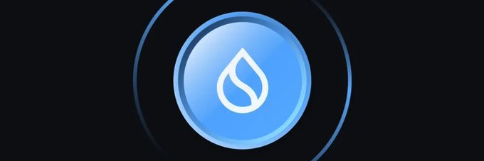 A blue circular logo featuring a white water droplet icon against a dark background, representing the Sui ($SUI) cryptocurrency. The image visually anchors the post's discussion about the user's recent experience bridging back to the Sui blockchain network.