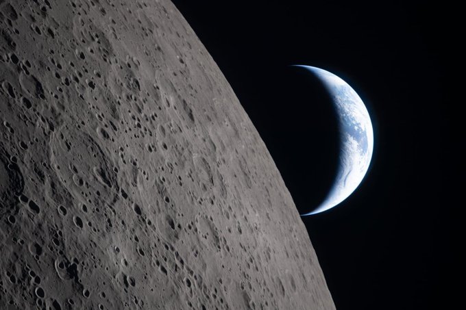 The image shows a view of the moon with Earth's shadow cast over it. This creates an interesting contrast between the dark side of the moon and its bright side. The moon appears as a white circle against the black background, emphasizing the difference in brightness. The caption above the image provides context about the post by mentioning "Good night mate." It seems that someone has posted this image to share their experience or knowledge about the moon's shadow with others.