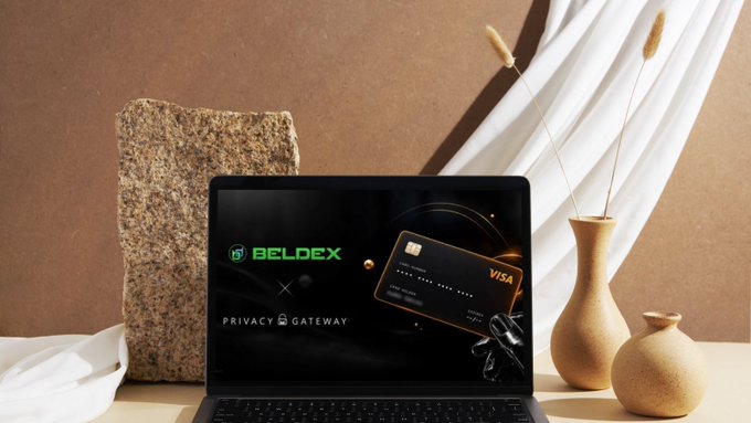 A laptop displaying the Beldex 'Privacy Gateway' logo alongside a Visa card image, set on a styled desk with vases and decorative elements.