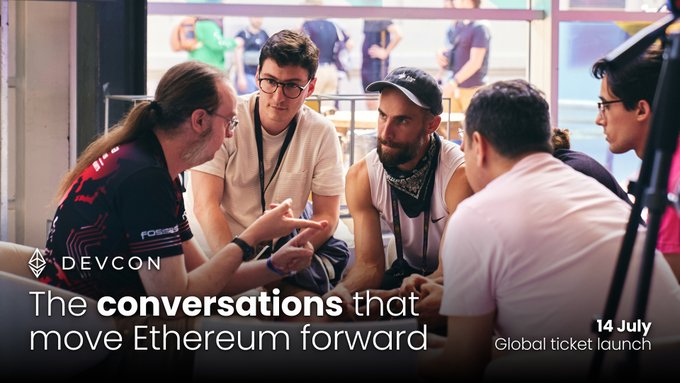 A group of people engaged in conversation at a Devcon event, with overlaid text reading "DEVCON - The conversations that move Ethereum forward" and "14 July Global ticket launch," promoting the upcoming Devcon 8 ticket release in Mumbai as a moment to unite and strengthen Ethereum's shared purpose.