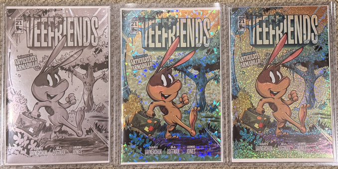 Three comic book covers titled 'VEE FRIENDS' featuring an 'Anticipated Armadillo' character, shown in black and white sketch and two different holographic foil variants.