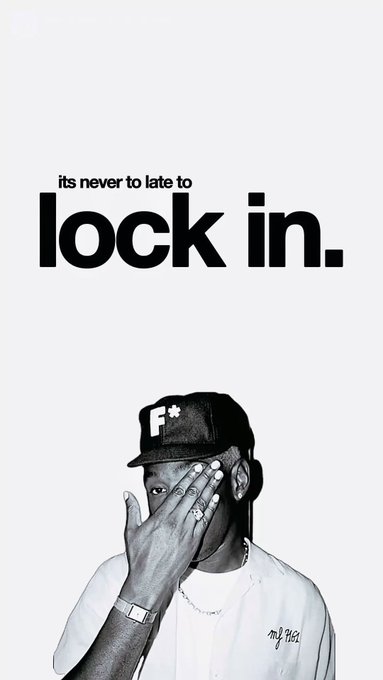 A motivational poster reads 'its never to late to lock in.' featuring a man wearing a black cap with 'F*' on it, covering his face with his hand.