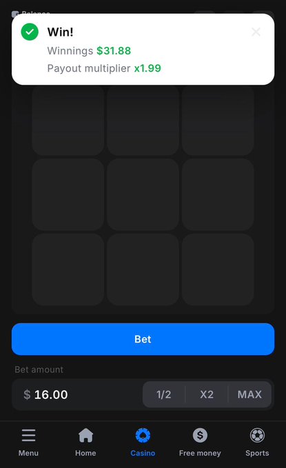A screenshot from the Crypto Merge game on 1win shows a winning notification with $31.88 in winnings at a 1.99x payout multiplier, along with a $16.00 bet amount on a 3x3 grid of crypto tiles. The image illustrates the game's outcome, complementing the post's explanation of the matching and merging gameplay mechanic.