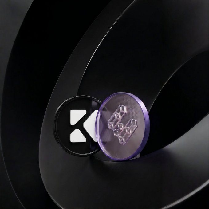 A sleek close-up image of a black electronic device featuring circular buttons with a triangle logo and a purple-accented button displaying a geometric "U" symbol.