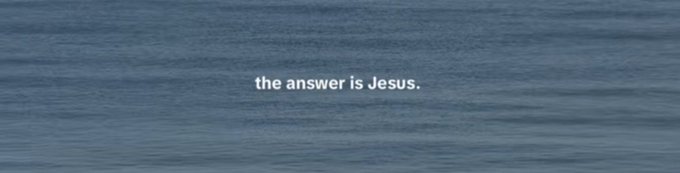 A simple image with the text 'the answer is Jesus.' centered over a dark blue water background.