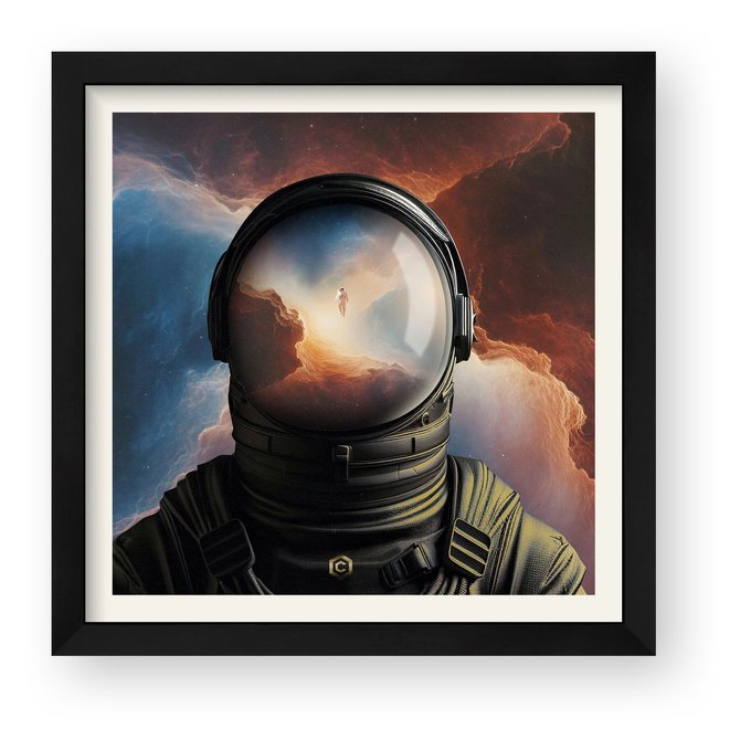 A framed artwork depicting an astronaut in a spacesuit with a cosmic scene and a small figure reflected in the helmet's visor.