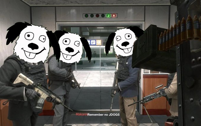 A scene from a tactical video game showing three characters with cartoon dog faces superimposed on them, holding weapons near a doorway with the text "Makao: Remember no JDOGS" displayed at the bottom. The meme format absurdly links the "no JDOGS" instruction to the post's argument that $JDOG is undervalued and runs the entire "machine and printer" ecosystem.