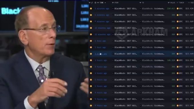 The image features a man dressed in a suit standing next to a computer screen that displays financial data. He seems to be explaining something about Bitcoin, as suggested by his position near the computer screen. The scene conveys an atmosphere of seriousness, as if the man is presenting some important information or discussing a significant event related to cryptocurrency trading.