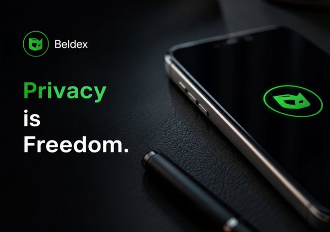 A promotional graphic for 'Beldex' featuring the text 'Privacy is Freedom.' in green and white, alongside an image of a smartphone displaying the Beldex logo on a dark background with a pen.