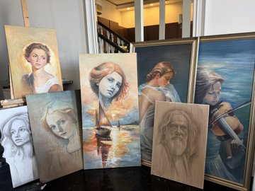 Several classical-style oil paintings featuring portraits of women and a bearded man are displayed on easels in a gallery setting.