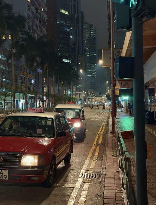 A red taxi marked "TAXI" is stopped on a dimly lit city street at night, with its license plate reading "A 49" visible, alongside a white van and tall buildings in the background.

The image appears to relate to the post's theme of trustworthiness in business practices—much like how one might question the ethics of a taxi service cutting corners, the post draws a parallel to cryptocurrency exchanges, suggesting that unethical tactics like paying to FUD competitors reveal a fundamental lack of trustworthiness that should disqualify them from handling customers' assets.