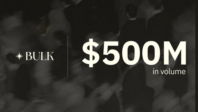 A dark, motion-blurred background of silhouettes in formal attire frames bold cream-colored text reading "BULK | $500M in volume," visually reinforcing the post's celebration of reaching $500 million in trading volume on BULK's invite-only mainnet during "bulking szn."