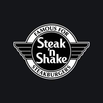 The image shows a logo for a restaurant called Steak ' n Shake, which offers shakes as part of their menu items. The logo features a circle with a white border and black lettering that reads "Steak 'n Shake." Inside this circle is another smaller circle, also containing the words "Steak 'n Shake" written in black capital letters, within the overall design.