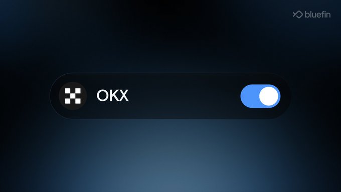 A sleek dark interface displays the "OKX" logo alongside an activated blue toggle switch, visually confirming that the OKX Aggregator has been successfully enabled on Bluefin Spot. The "bluefin" branding in the top right corner reinforces the platform integration referenced in the announcement.