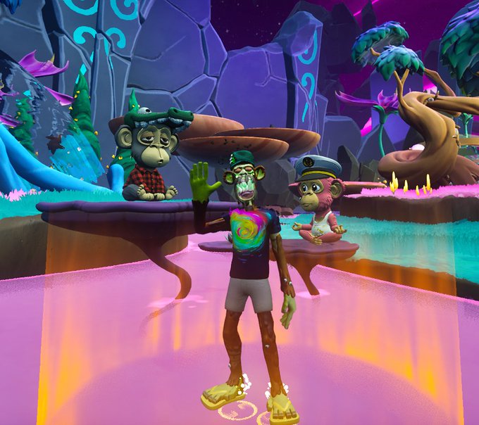 A 3D animated video game scene shows a character in a tie-dye shirt and gray shorts standing on a pink pathway, waving at two monkey characters in a vibrant, colorful fantasy environment.