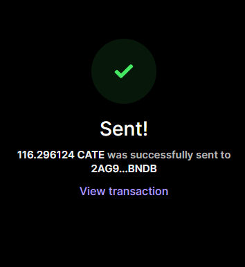 The image shows a cryptocurrency transaction confirmation screen with a green checkmark, displaying "Sent!" and confirming that 116.296124 CATE tokens were successfully sent to the wallet address 2AG9...BNDB, with a "View transaction" link. This visually supports the post's message about sending $CATE tokens to a wallet while encouraging recipients to keep manifesting wins.