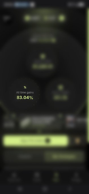 A blurry screenshot of a financial app displaying 'All time gains' at '83.04%' in yellow text.
