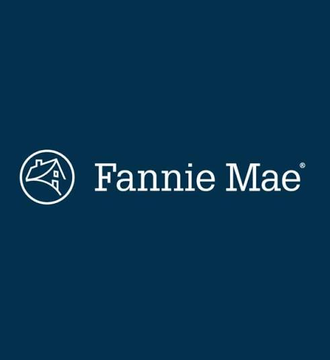 The image displays the Fannie Mae logo, featuring a stylized house icon within a circle next to the "Fannie Mae" name in white text on a dark blue background. This relates to the post by highlighting Fannie Mae's historic acceptance of a Bitcoin-backed mortgage, a milestone that coincided with significant Bitcoin price appreciation.