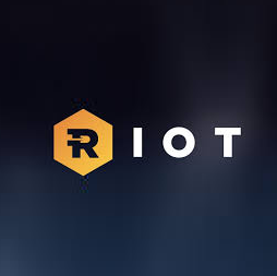 The image displays the Riot (RIOT) logo—a stylized orange hexagon with an "R" inside—against a dark background, representing the cryptocurrency mining company that sold 5,886 BTC in Q2 2024. This branding visually anchors the post's key financial highlights about Riot's mining operations, including its $49,912 cost per BTC, $728M in remaining holdings, and collateral-backed reserves.