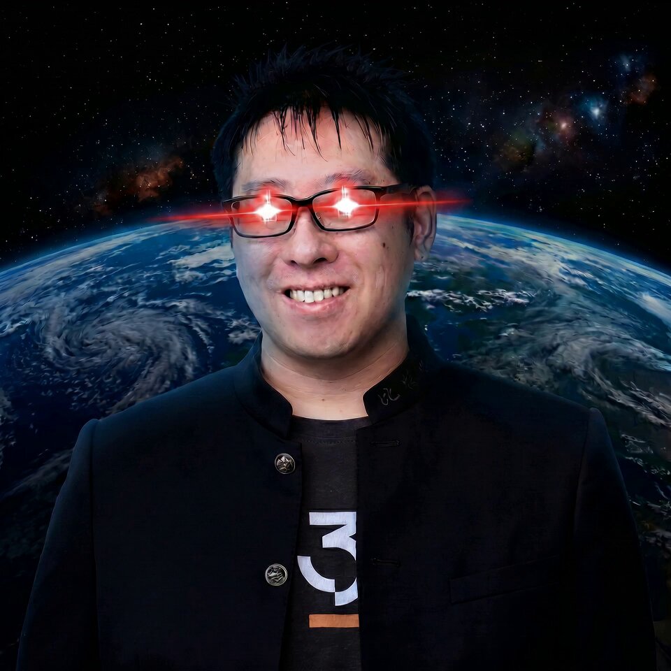 The image features a man wearing glasses, smiling at the camera with his eyes glowing red. He is dressed in a black suit jacket and has a name tag that reads "3". The background of the photo shows a planet Earth, which adds an interesting context to the scene. There are also stars visible in the sky above the planet. The image includes text that says "I've never been more bullish on Bitcoin", possibly referencing the man's interest or opinion about Bitcoin.