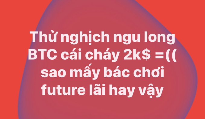 A red graphic with white Vietnamese text complaining about Bitcoin futures trading burning 2k dollars, expressing frustration about why people play futures.