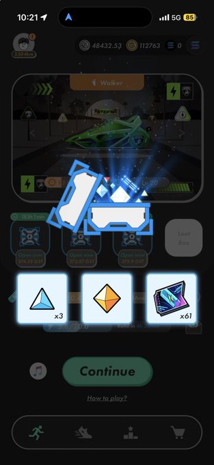A mobile game screenshot showing a loot box opening screen with rewards including x3 blue triangle items, x1 orange diamond, and x61 blue crystals, with a 'Continue' button at the bottom.