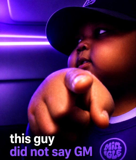 A child wearing a dark cap pointing at the camera under purple lighting, with text reading "this guy did not say GM" and a "Miss Migle" logo.