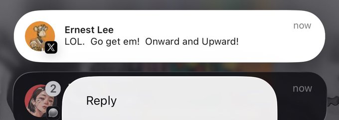 A notification from Ernest Lee on X reads "LOL. Go get em! Onward and Upward!" in response to the post announcing that the ₿-R4ted Community is eligible for Phase 1 of the @unvault mint.