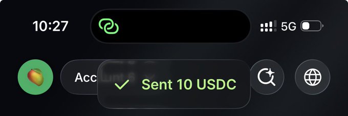 A smartphone notification bar displays "Sent 10 USDC" with a green checkmark, confirming a successful crypto transfer. This visualizes the sender's confirmation that they sent a reward to the recipient mentioned in the accompanying post.
