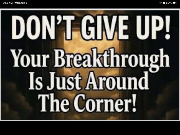 Inspirational graphic with the text "DON'T GIVE UP! Your Breakthrough Is Just Around The Corner!" displayed against a dark background with clouds.