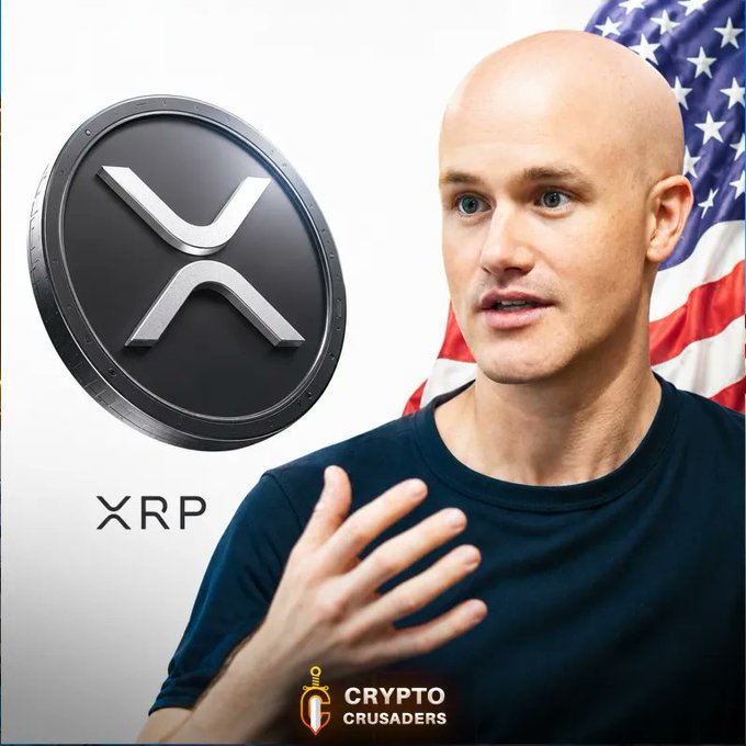 The image features an older man wearing glasses with his hands raised in front of him, giving the impression that he's speaking or gesturing. The man appears to be in a casual setting, possibly having just returned from a walk outside. The background includes a flag and a banner displaying the word "RIPPLE". In the middle of this scene, there is an logo of Ripple cryptocurrency, which might indicate their association with the coin.