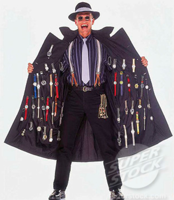 A smiling man in a black hat, sunglasses, striped shirt, and tie displays a black coat lined with many wristwatches; a “SUPER STOCK” watermark is visible in the lower-right corner.
